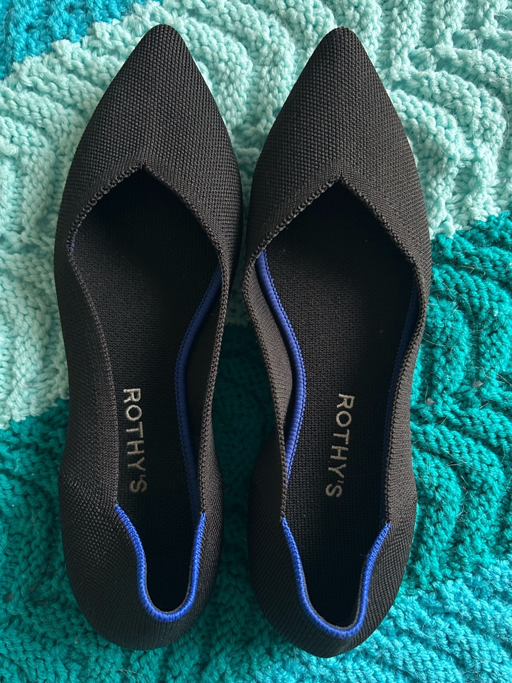 Rothy's Black Pointed Flats with Blue Trim